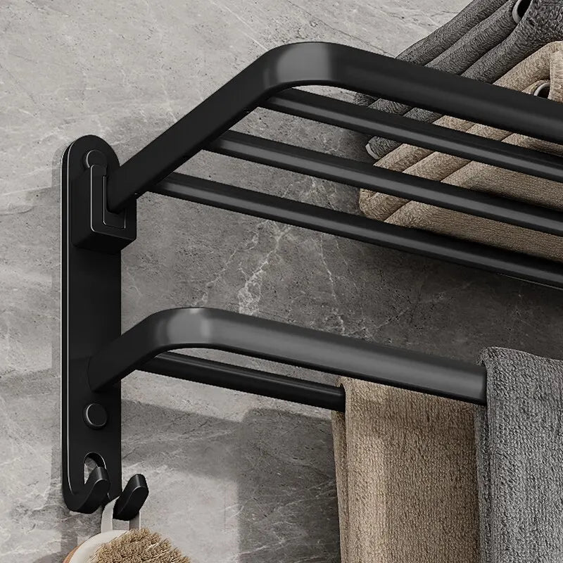 Matte Black Folding Aluminium Towel Rack with Hook displaying folded towels, ideal for modern bathrooms.
