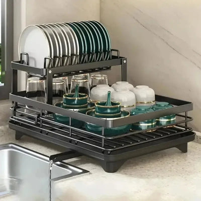 Stylish adjustable stainless steel dish drying rack with plates and bowls, enhancing kitchen organization and drying efficiency.