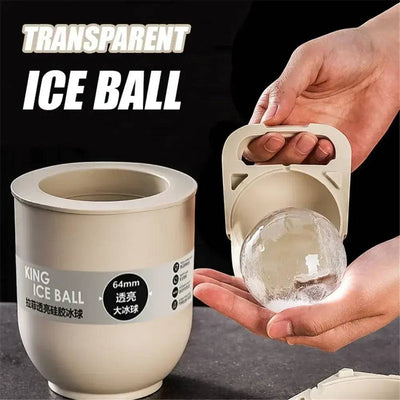 Clear ice ball mold for whiskey, showcasing a transparent ice ball being released from the silicone mold.