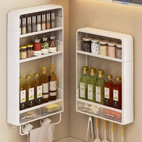 Wall mounted kitchen rack with drawer showcasing organized spices, oils, and seasonings for space-saving storage.