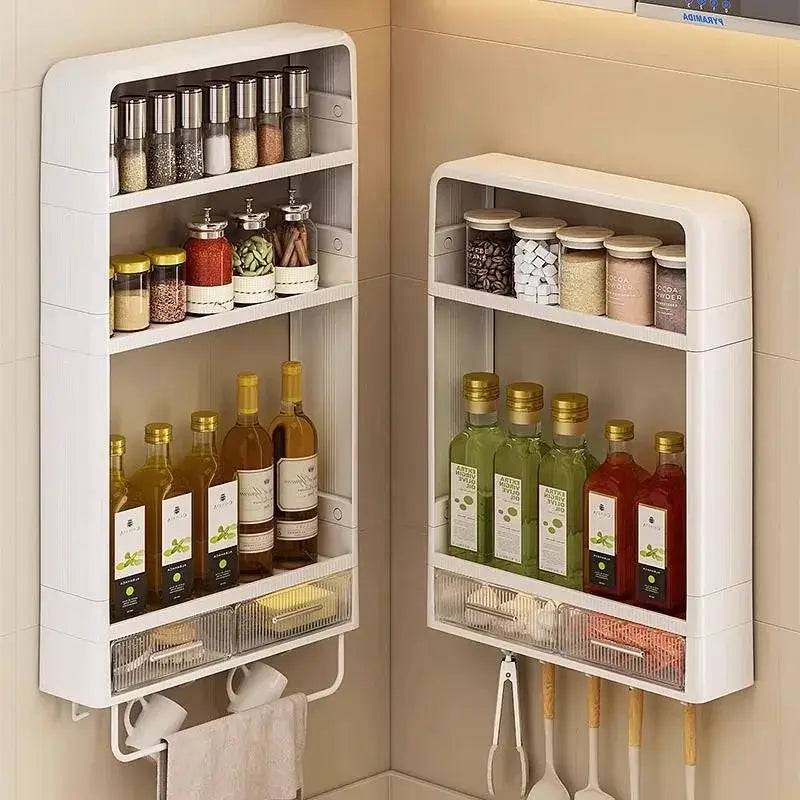 Wall mounted kitchen rack with drawer showcasing organized spices, oils, and seasonings for space-saving storage.