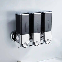 Wall mounted manual soap dispenser with three chambers, sleek design, 500ml capacity, perfect for bathrooms and kitchens.