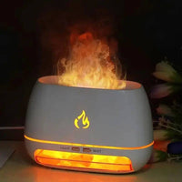 Mini Ultrasonic Flame Aroma Diffuser with soothing mist and flame effect for aromatherapy.