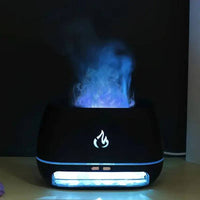 Mini Ultrasonic Flame Aroma Diffuser emitting colorful vapor, perfect for creating a soothing atmosphere in small spaces.