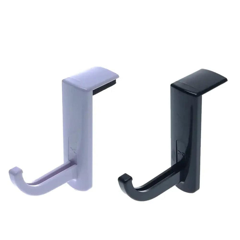 Universal headphone holder in black and lavender plastic for organizing audio gear.