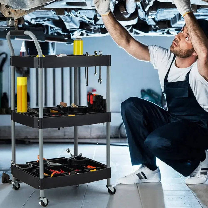 3-Tier Mobile Tool Cart with 360° wheels, organized tools, and a mechanic working under a vehicle.