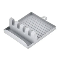 Gray plastic utensil holder with non-slip design for organized kitchen tools and utensils.