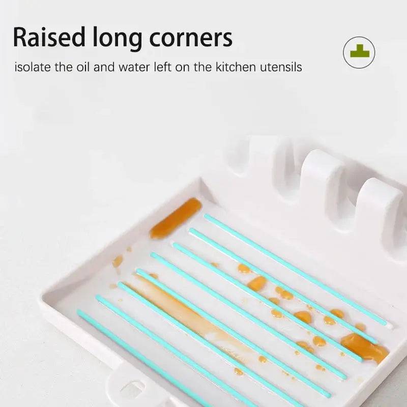 Kitchen utensil holder with raised long corners, isolating oil and water for easy cleaning and organization.