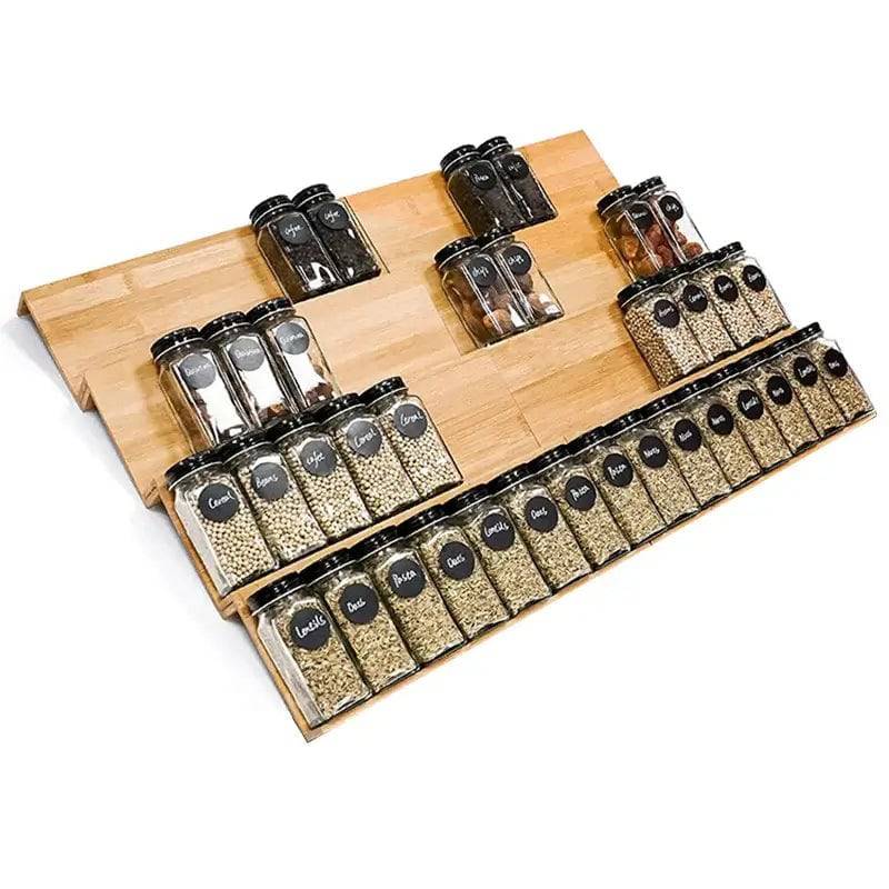 Bamboo spice rack with four tiers, organized jars and containers for an eco-friendly kitchen storage solution.