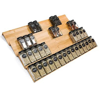 Bamboo spice rack with four tiers, organized jars and containers for an eco-friendly kitchen storage solution.