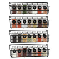 Wall-mounted metal spice rack with labeled spice jars, space-saving design for an organized kitchen.