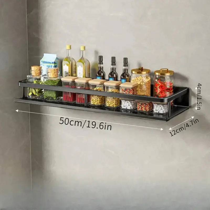 Wall-mounted spice rack displaying jars, oils, and spices in a sleek black design, perfect for kitchen organization.
