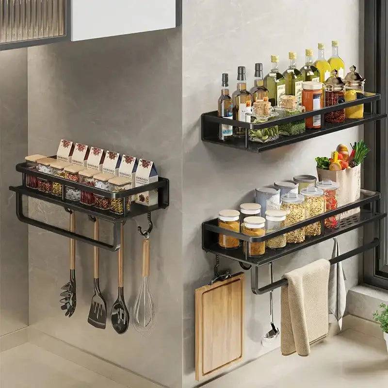 Stylish wall-mounted spice rack featuring shelves for bottles, jars, and a towel bar for enhanced kitchen organization.