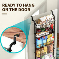 Multi-tier overdoor storage basket ready to hang on a door, featuring various containers for organized storage.