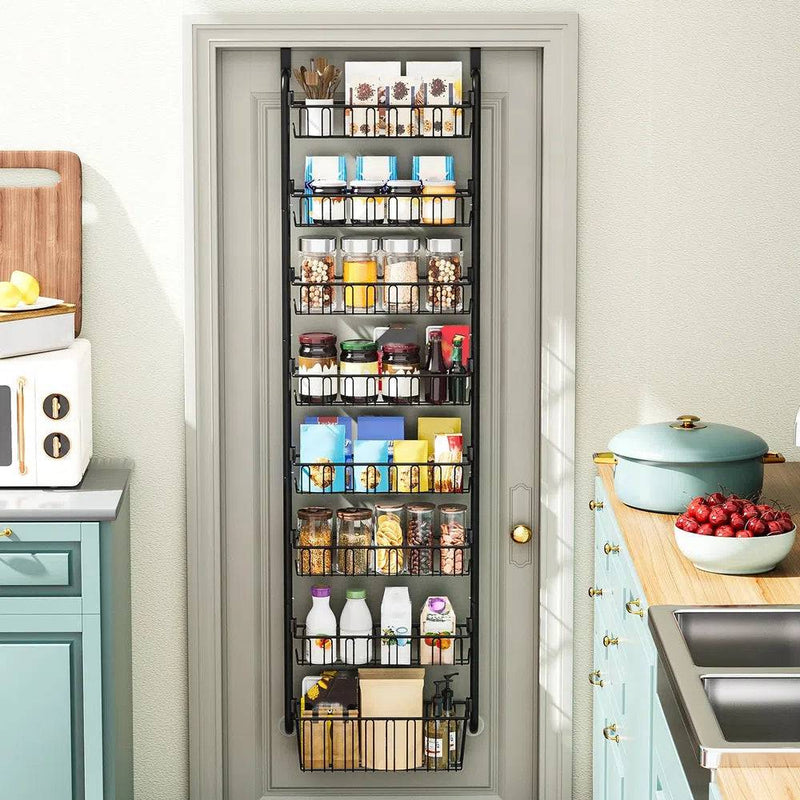 Multi-tier overdoor storage basket made of carbon steel, organized with jars and boxes, maximizing kitchen space.