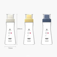 Three 350ml Multi-Purpose Condiment Dispensers with clear bottles and colored lids for easy seasoning access.