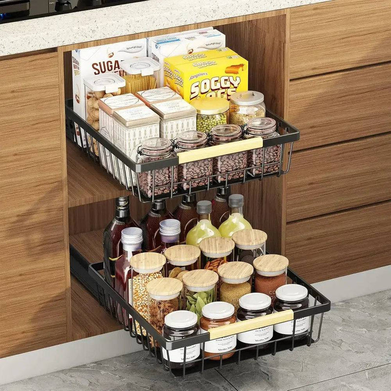 Sliding pull out cabinet organiser with jars and boxes in sleek kitchen design, maximizing storage efficiency.
