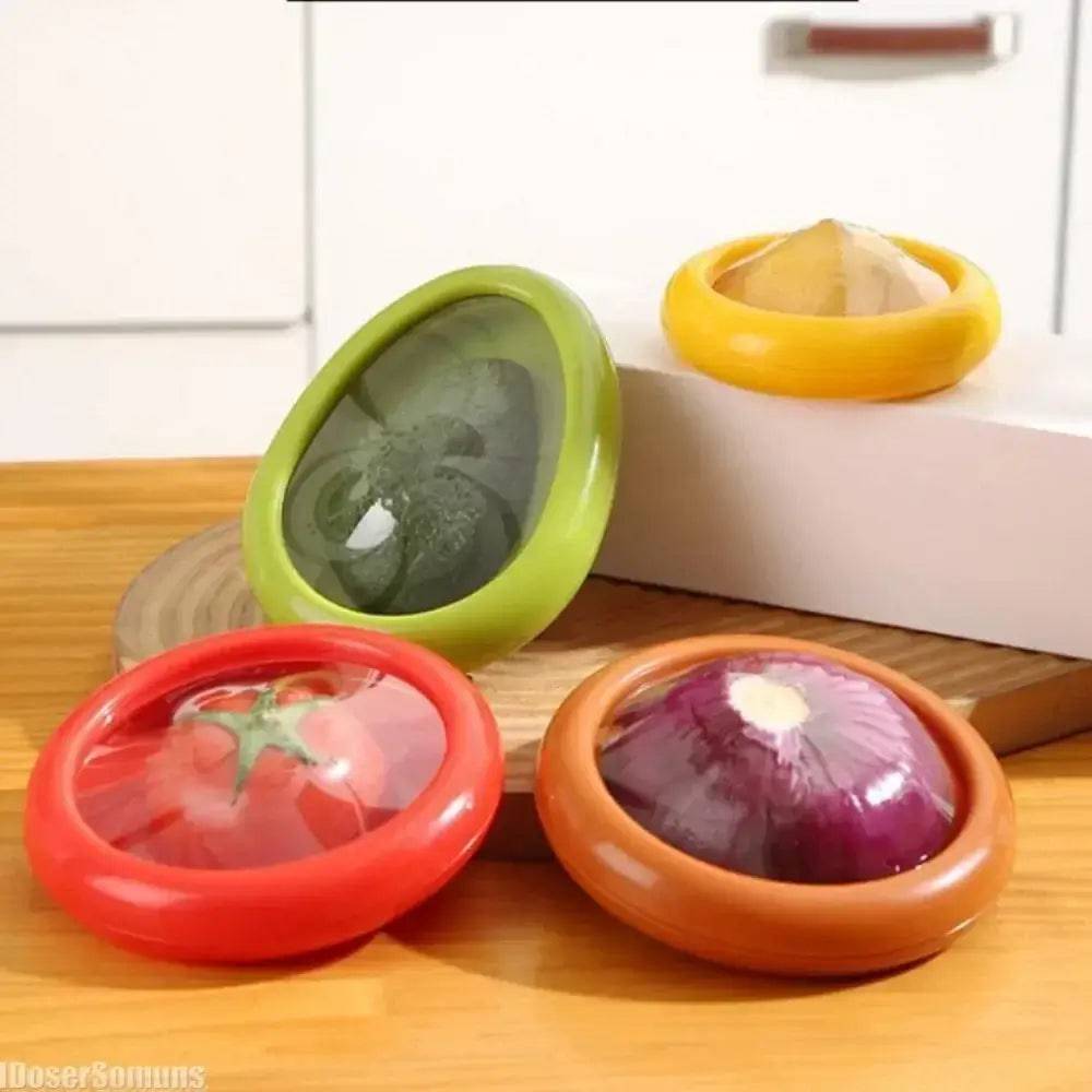Colorful silicone food storage covers for fruits and vegetables on a wooden table.