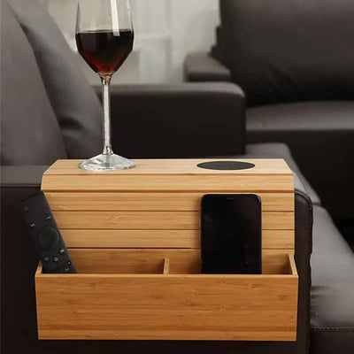 Wooden sofa armrest organizer with cup holder, remote pocket, and phone slot, perfect for living room convenience.