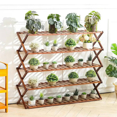 Bamboo Flower Stand Multi-Tier Display with various potted plants, showcasing greenery and natural charm indoors.
