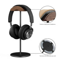 Walnut headphone stand with aluminium base showcasing premium design and double fit for better support.