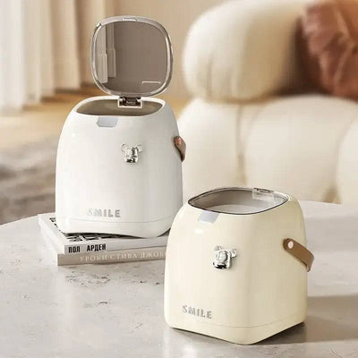 Compact desktop bins with practical handles in white and cream for efficient waste management.