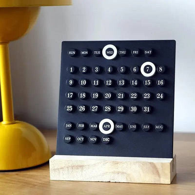 Stylish acrylic desk calendar with wooden stand, featuring customizable date display and modern design for any workspace.