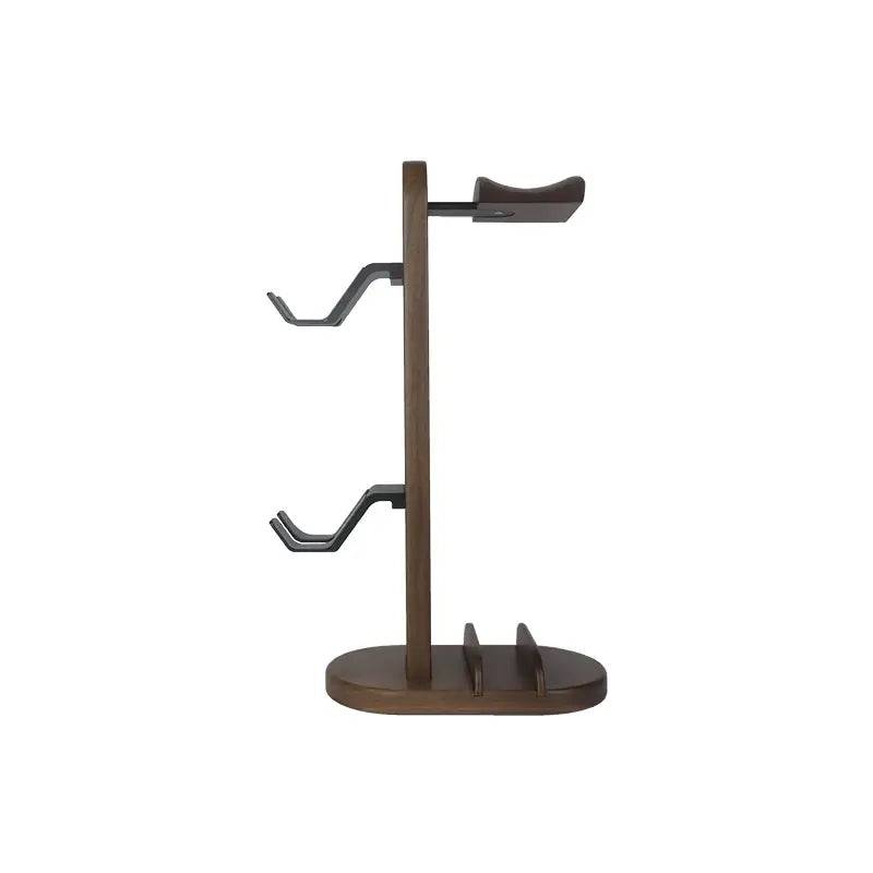 Walnut wood headphone stand with sleek aluminum frame, ideal for stylish organization and support for headphones.