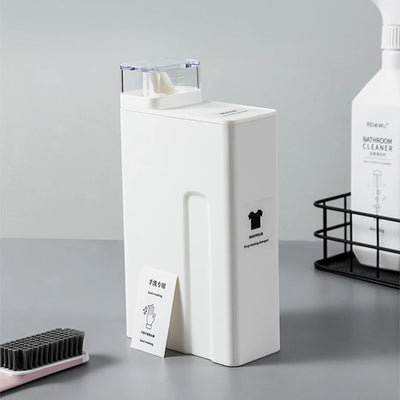 Eco-friendly reusable laundry detergent bottle with clear top, promoting sustainable living in modern washrooms.