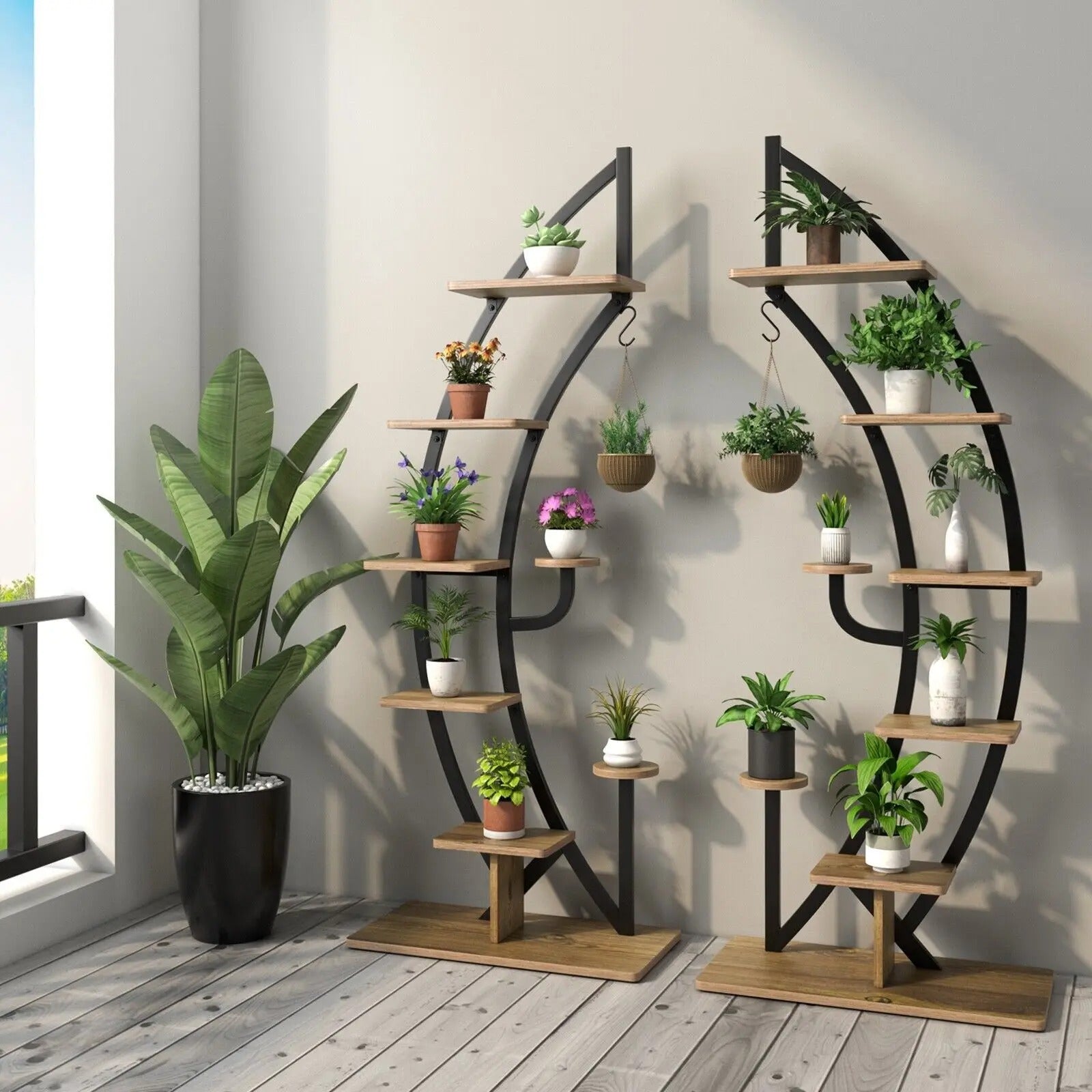 Elegant 6-tier metal plant stand with shelves displaying various potted plants in a stylish indoor setting.