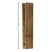 Giant wooden towel clip measuring 12 inches tall, featuring a rustic design for home decor and functionality.